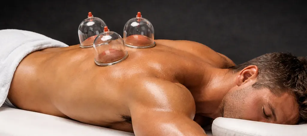 Cupping therapy session at Elite Healers Sports Massage in Midtown East NYC — performance recovery for athletes